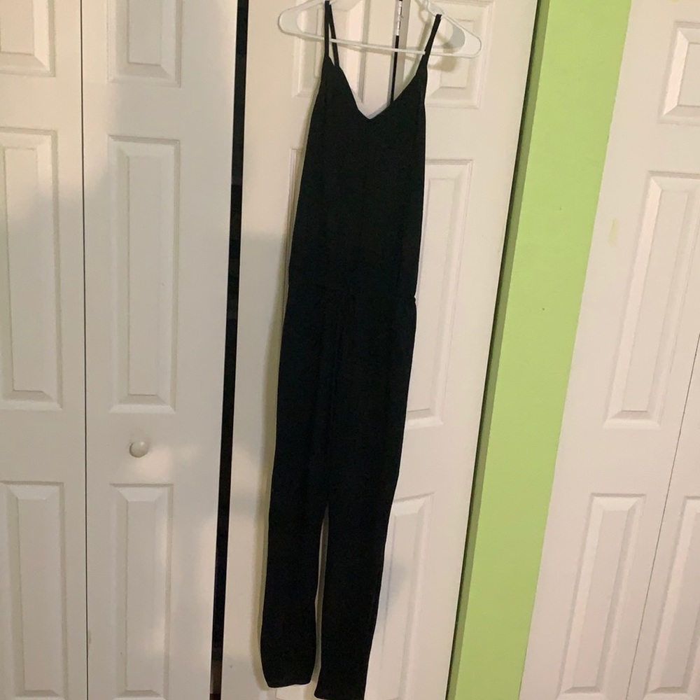 Black jumpsuit with tie and open back!